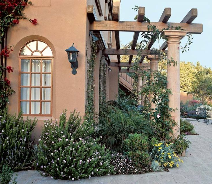 A simple pergola enhances a masonry house in Santa Barbara. (Photo ...