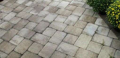 How to Install Pavers Over a Concrete Patio Without Mortar ...