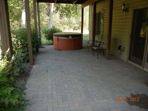 How to Lay Pavers for a Patio: Fixing a Brick Patio ...