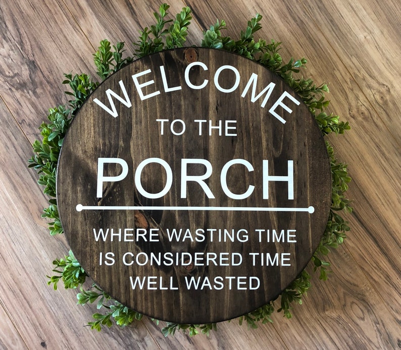 Welcome to the porch round wooden sign