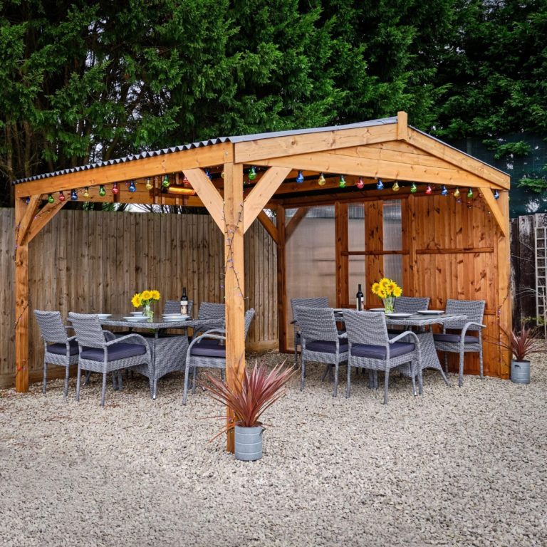 Wooden gazebo with side panel options and grey rattan furniture ...